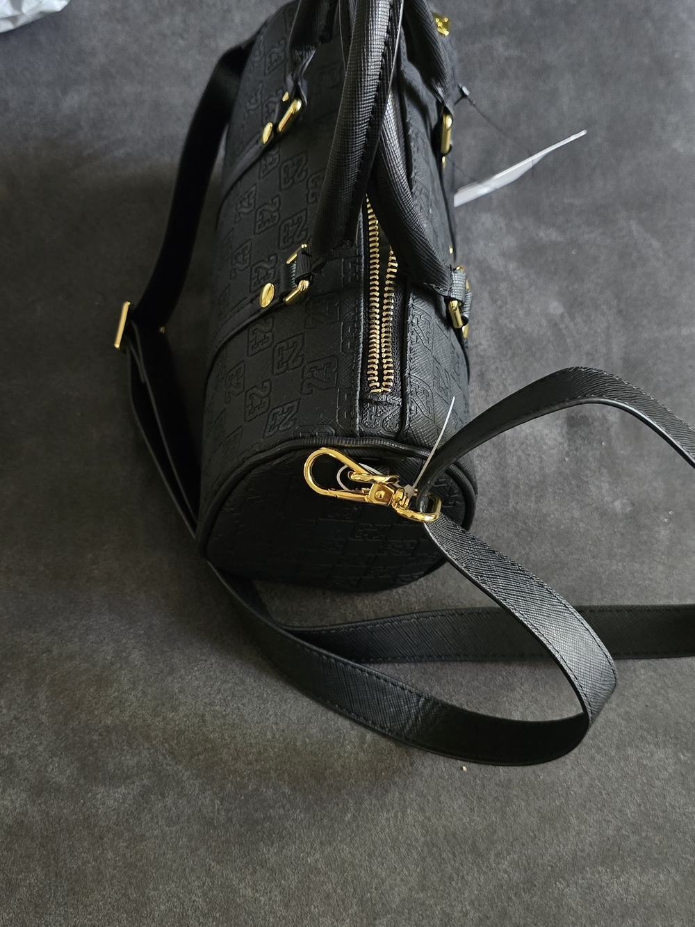 A black Jordan Monogram Mini Duffle Bag With Jump Man On It - Picture 4 of 10